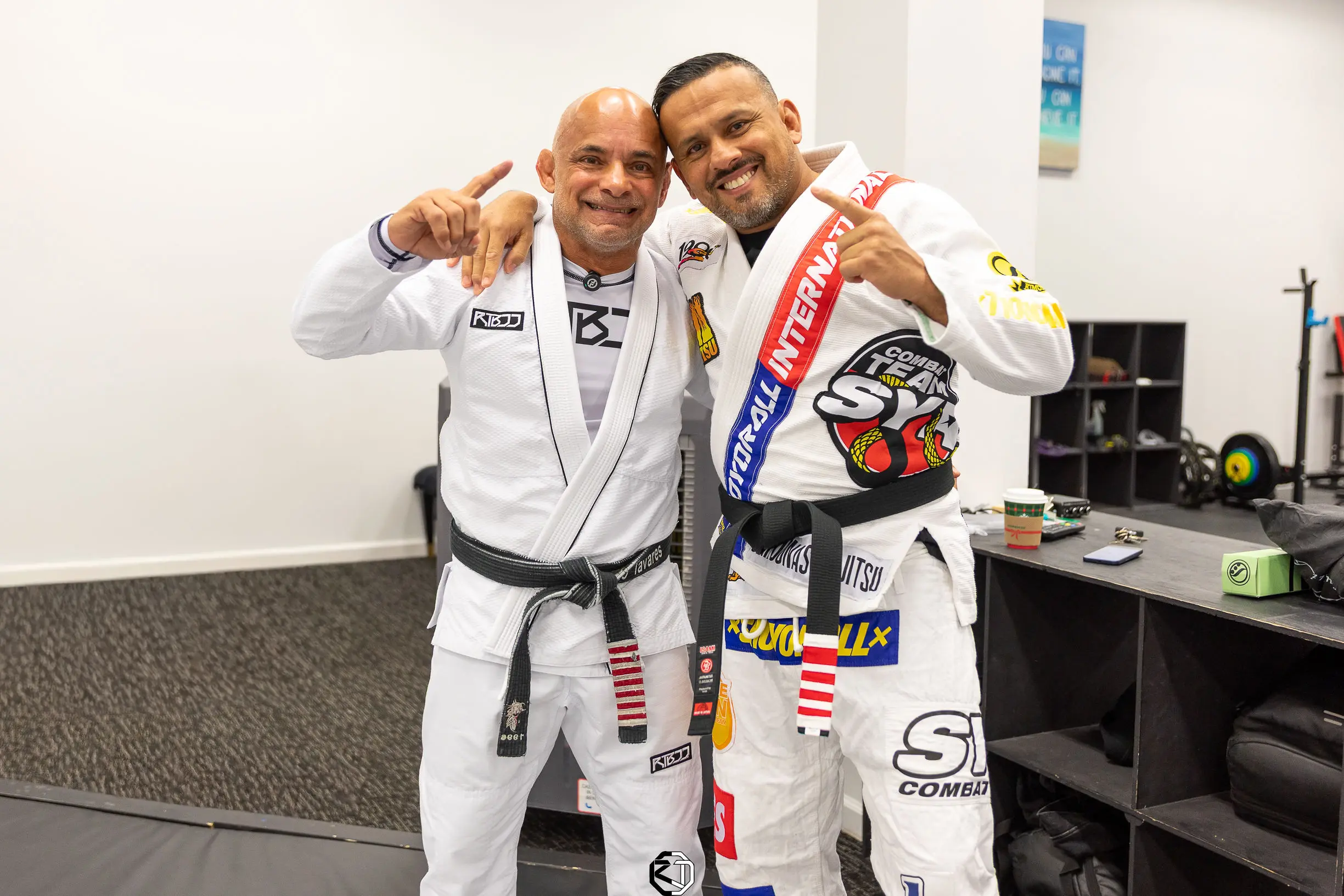 Master Renato Tavares with Carlson Gracie Jr. on the mats at RT Headquarters, after the seminar